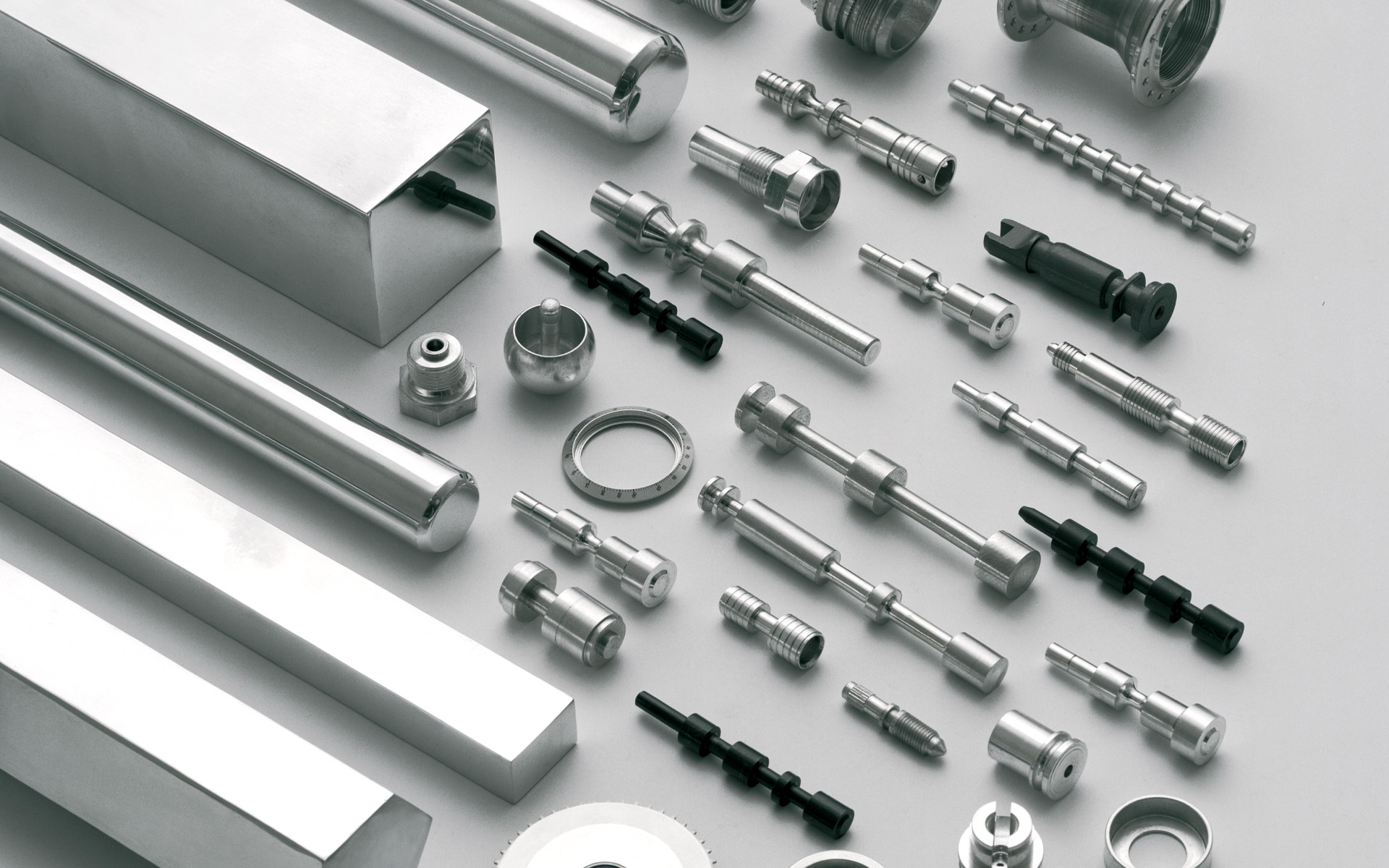 Flat-lay of finished machined aluminium components